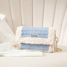 sky-blue wool handbag